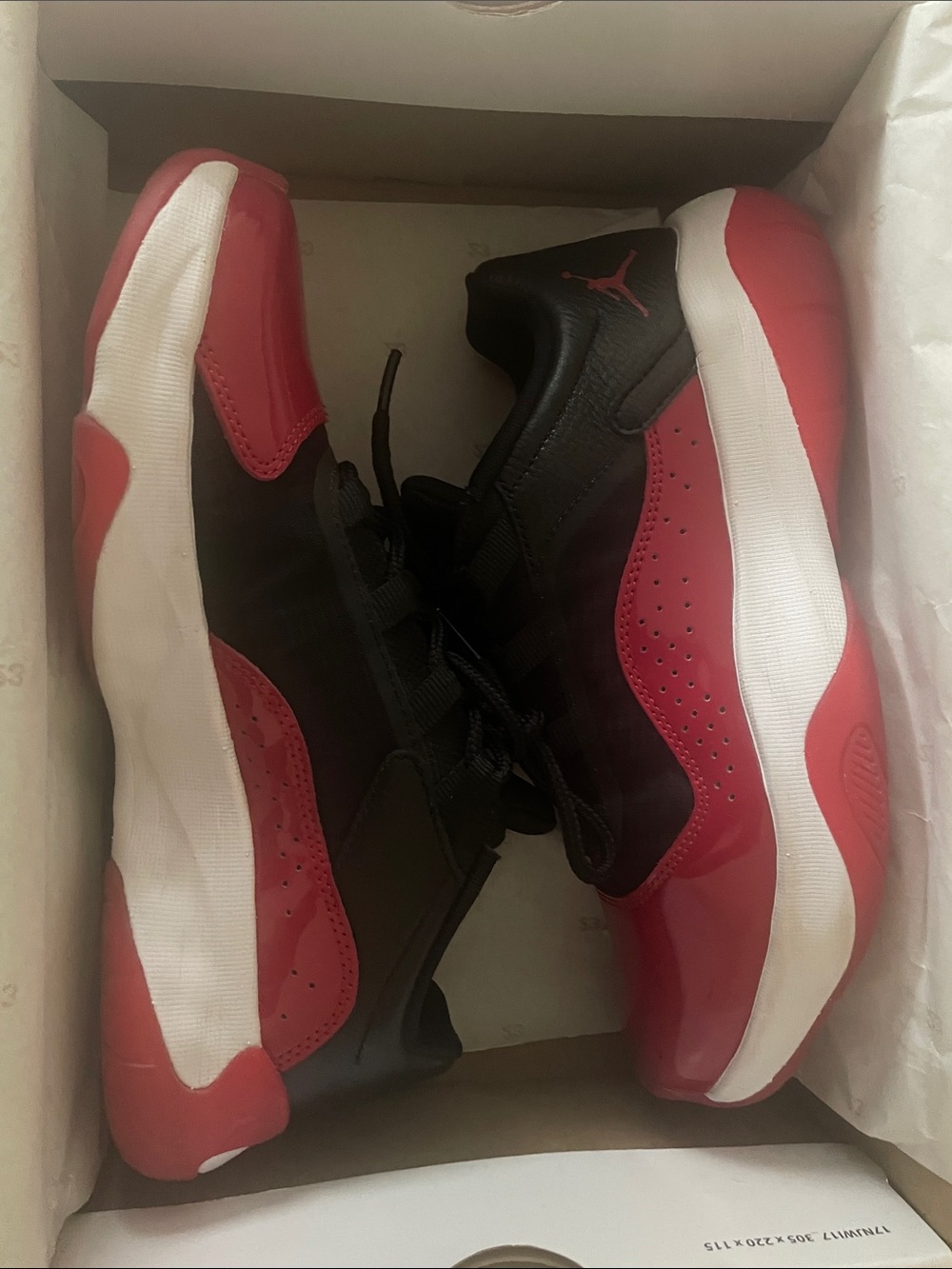 NIKE Air Jordan 11 Women’s Black & Red Sneakers